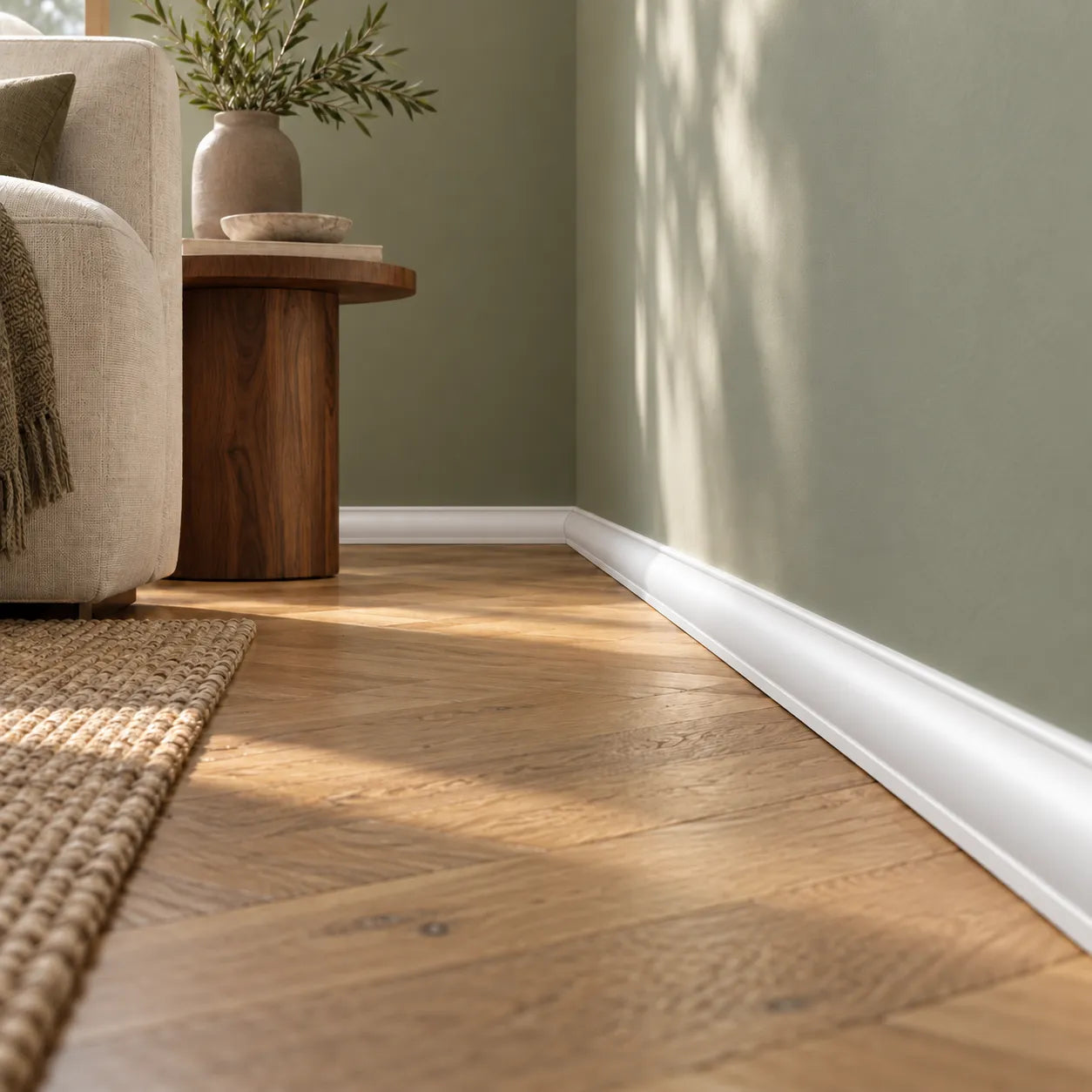 White WT7 WALLSTYL skirting profile in a warm modern living room