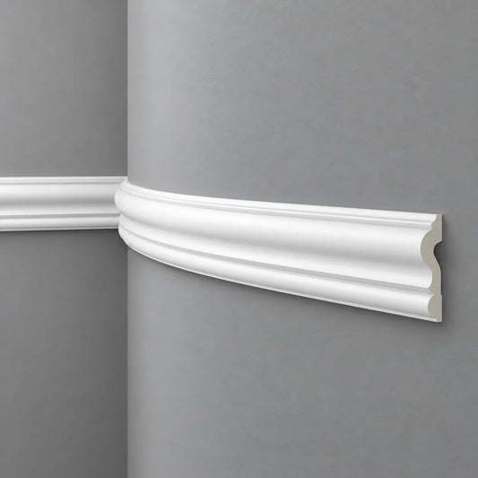 White Z1360 Flex dado rail following a curved grey wall with a visible end profile