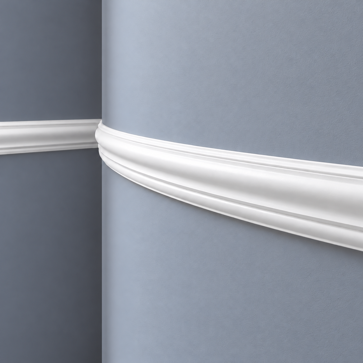 Close-up of white Z13 Flex dado rail following a curved grey wall.