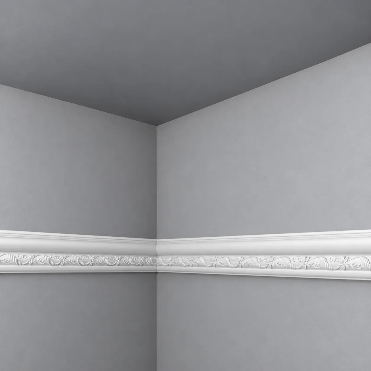 White Z30 decorative dado rail with acanthus leaf detailing installed around a grey wall corner